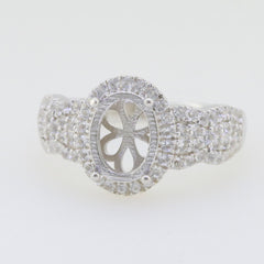 Sterling Silver Semi Mount Ring Setting with oval White Topaz, intricately designed with sparkling detail.