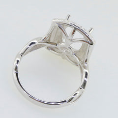 Sterling silver semi mount ring setting with white topaz accent, showcasing cushion design for 12x8mm gemstone.