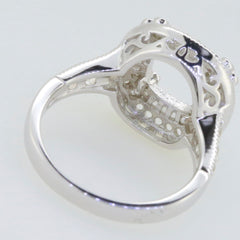Sterling silver semi mount ring setting with intricate details, ready for gemstones, highlighting craftsmanship and elegance.