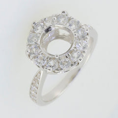Sterling silver semi mount ring setting featuring an 8x8mm round halo with moissanite accents, ready for customization.