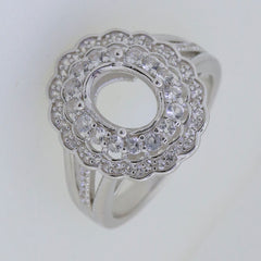 Sterling Silver Semi Mount Ring Setting with Double Halo design and space for Oval gemstone, adorned with White Topaz accents.