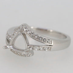 Sterling silver semi mount ring setting with moissanite accents in a trillion halo design.