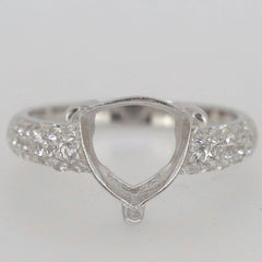 Sterling silver semi mount trillion ring setting with Moissanite accent, designed for custom gemstone placement.
