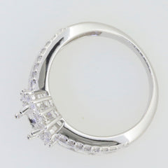 Sterling silver semi mount ring setting with oval halo and moissanite accent; customizable to various sizes.