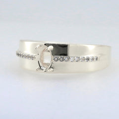 Sterling silver semi mount ring setting with oval center and moissanite accents, unisex design.