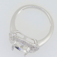 Sterling silver semi mount ring setting with white topaz accents, designed for an oval 12x10mm gemstone.