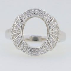 Sterling Silver semi mount ring setting with a halo design and White Topaz accents, suitable for oval gemstones.