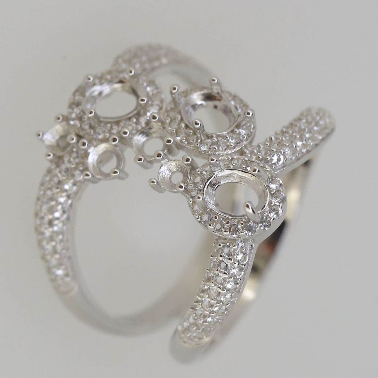 Sterling Silver Semi Mount Ring Setting with oval and round cut stone placeholders, double row split shank design.