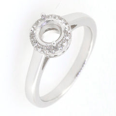Sterling silver semi-mount ring setting, round halo with Moissanite accents, designed for custom gemstone options.