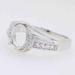 Sterling silver semi mount ring setting with oval center and moissanite accent stones, ideal for custom jewelry.