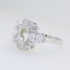 Sterling Silver Semi Mount Ring Setting for 9x7mm oval gemstone with White Topaz accents.