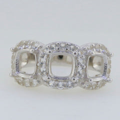 Sterling silver semi mount ring setting with cushion cut moissanite, featuring a 3 stone halo design.