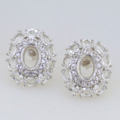 Sterling silver semi mount earrings setting featuring double halo design with white topaz accents, for custom gemstone options.