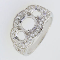 Sterling silver semi mount ring setting with Moissanite accents, featuring three round settings for gemstones.