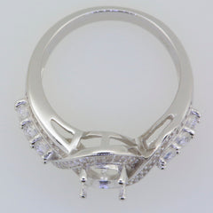 Sterling Silver semi mount ring setting with twisted shank and white topaz gemstones, designed for an oval stone.
