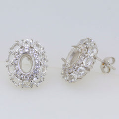 Sterling silver semi mount earrings setting featuring white topaz stones, designed for 8x6mm oval gemstones in double halo style.