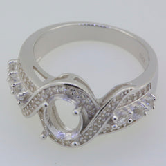 Sterling Silver Semi Mount Ring Setting with Oval 8x6mm, Twisted Shank and White Topaz accents.