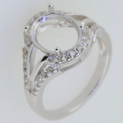 Sterling silver semi mount ring setting with moissanite accent, designed for 10x8mm oval gemstone.