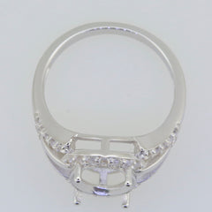 Sterling silver semi mount ring setting with moissanite accents, designed for an oval gem 10x8mm, split shank style.