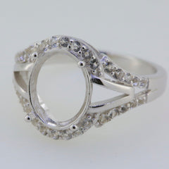 Sterling silver semi mount ring setting with oval center and moissanite accent stones, split shank design.