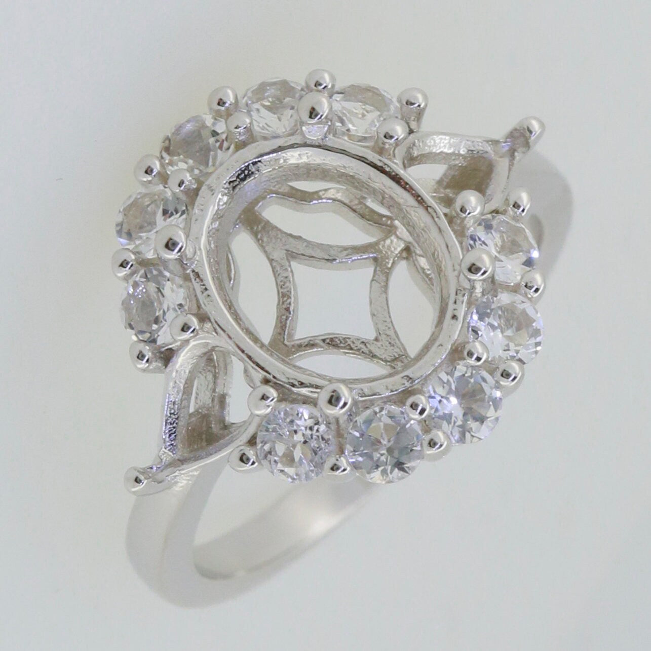 Sterling Silver Semi Mount Ring Setting for Oval 11x9mm and Pear 6x4mm Moissanite stones in a halo design.