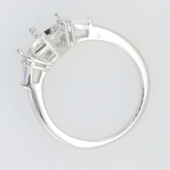 Sterling silver semi mount ring setting with oval space for 10x8mm gemstone and baguette accent stones.