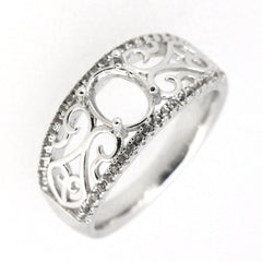 Sterling silver semi mount ring setting with filigree design, featuring an oval center and topaz accents.