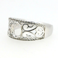 Sterling silver semi mount ring setting with filigree design, featuring an oval 8x6mm stone placeholder and topaz accents.