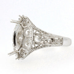 Sterling silver semi mount ring setting with Art Nouveau style scroll design, featuring a 10x5mm marquise shape.