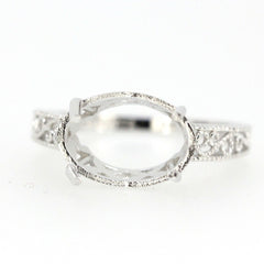 Sterling silver semi mount ring setting with art deco style scroll for 13x9mm oval gemstone.