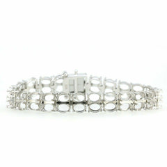Sterling silver semi mount tennis bracelet setting for oval 7x5mm stones with double row design.