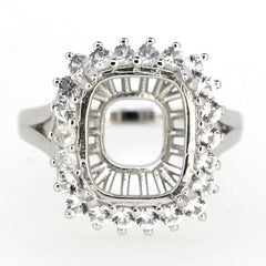 Sterling silver semi mount ring setting with halo and white topaz accents, designed for 12x10mm center stone.